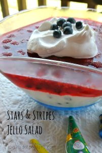 This salad is perfect for the 4th of July and includes raspberry and blueberry jellos, blueberries, raspberries, vanilla yogurt, gelatin, heavy whipping cream, sugar, and whipped topping.